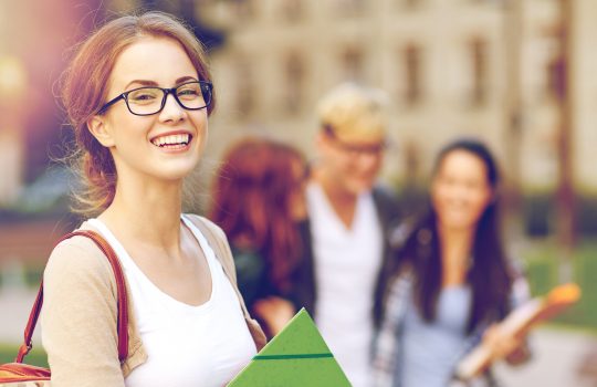 student evaluating massage school cost