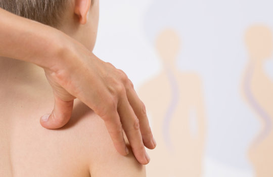 Boy with scoliosis